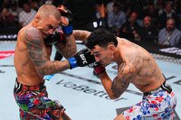 Дастин Порье уступил Максу Холлоуэю по очкам в своем прощальном поединке на турнире UFC 318